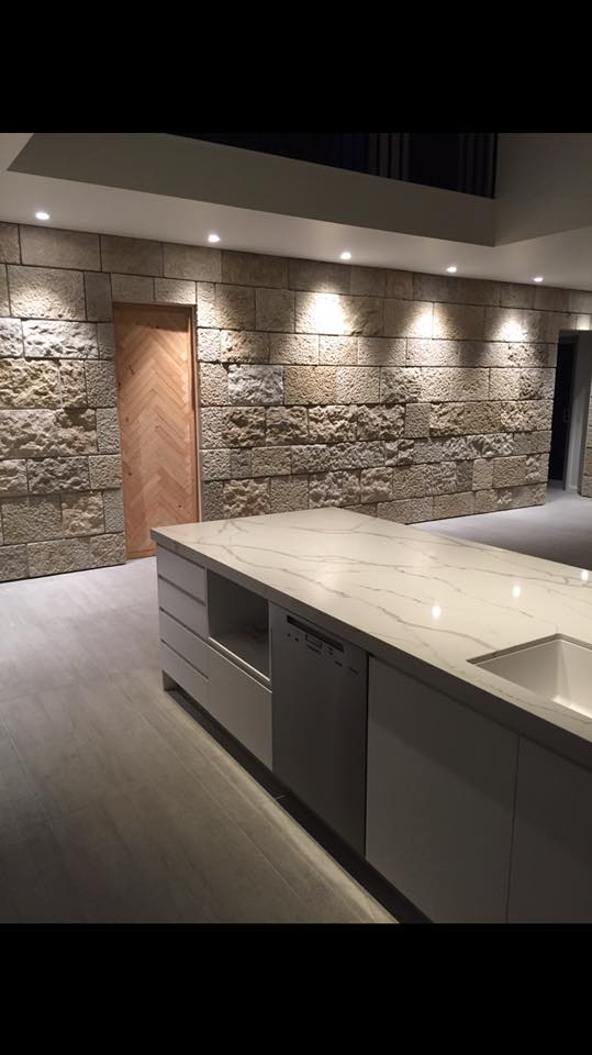 Kitchen stone wall with architectural downlights — Pether Electrical